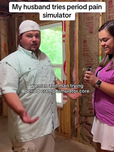 woman and man trying period cramp simulator core #period #fyp #viral #core #periodcramp