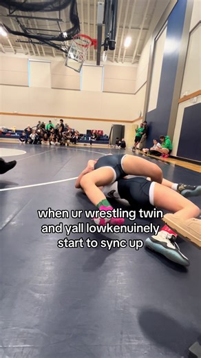 Wrestling Twins: Syncing Moves and Bonding Moments