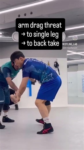 Arm drag to single leg to back take
