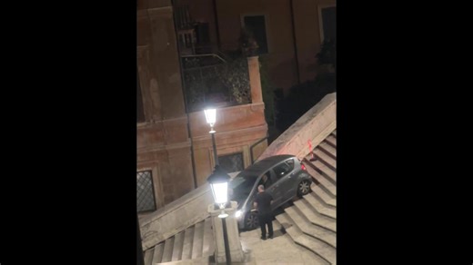 Bungling driver gets stuck driving down Rome's historic Spanish Steps