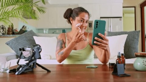 clip-3983700581-young-female-beauty-blogger-recording-video-tutorial