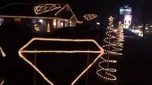 Is this a festive Christmas display or illegal advertising? That's what officials in Lewiston and Auburn are trying to figure out. Hear from the business owner who put up the lights and let us know what you think: http://wmtw.tv/6183Bp3qV | WMTW-TV