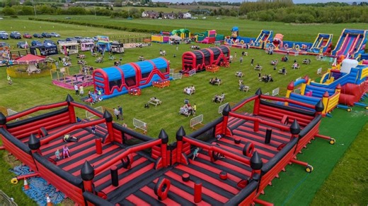 Giant outdoor inflatable bounce park reopens for Easter holidays