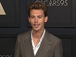 'Elvis' star Austin Butler in a gray suit at the 2023 Academy Awards luncheon
