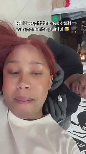 Butterfly Neck Tattoo Session: A Light-Hearted Experience