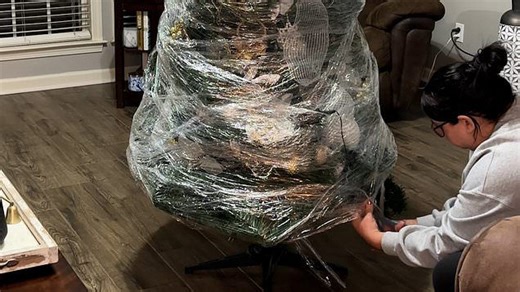 Christmas hack as woman unwraps fully decorated tree from last year