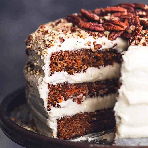 68K views · 1K reactions | WORLD’S BEST CARROT CAKE WITH CREAM CHEESE FROSTING- This recipe is so simple but has the absolute best flavor and perfectly moist texture, and is then piled high with the most heavenly, fluffy and rich cream cheese frosting. RECIPE: https://www.lecremedelacrumb.com/worlds-best-carrot-cake-with-cream-cheese-frosting/ | Creme de la Crumb | Facebook