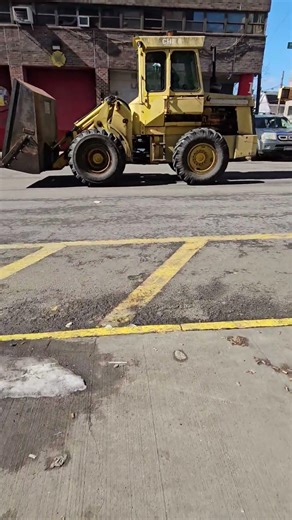 Interesting Looking Front End Loader Passing By On Washington Ave In Clearmont, The Bronx, New York