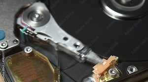 HDD head needle reading data. Computer Hard Disk Drive Internal Storage