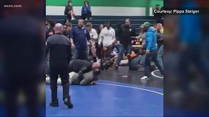 Dad charged with assaulting student who was wrestling son during tournament match