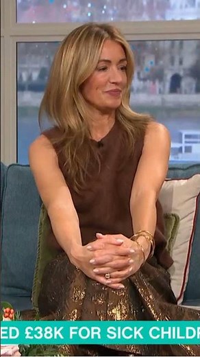 Cat Deeley Wears Sleeveless Brown Top & Burgundy Leather Boots (8/12/2025)