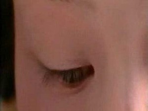 Maiko or Geisha putting on face make-up in Kyoto