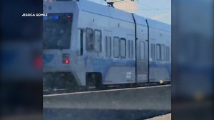 A man was seen riding on the outside of a moving VTA train in San Jose. A witness tells us the train surfer knew he was being recorded, going as far as smiling and waving at the camera. https://abc7ne.ws/3gQaW4T | ABC7 News