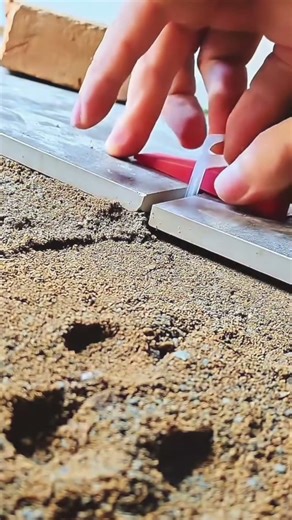 Using plastic spacers to help secure the installation of granite and ceramic tiles #construction