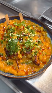 Creamy Cannellini Beans with coriander Chicken skewer! Ingredients ▶️creamy Beans ▶️olive oil 3 tbsp ▶️Chopped onion 1/2 ▶️garlic 3 cloves ▶️tomato puree 60 gram 5 tbsp ▶️cumin powder 1 tsp ▶️coriander powder 1 tsp ▶️paprika powder 1 tsp ▶️curry powder 1 tsp ▶️salt 1/2 tsp Cream 5 tbsp finishing time start with frying onion and garlic in pan add puree and spices , saute it add beans add some water too cook on low heat until soft and mushy , finish with curry powder nd cream Chicken marination ▶️