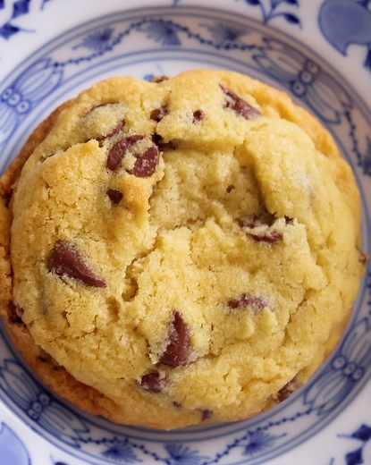 These classic Chocolate Chip Cookies are a must-try! With crisp edges, a soft center, and lots of melty chocolate in every bite, they will disappear in a flash. You can bake them straight from the bowl or freeze the dough for later! | Preppy Kitchen