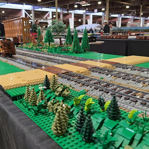 Southern 2716 charges over a rural grade crossing with an 8-car excursion in tow. | Monty's Trains