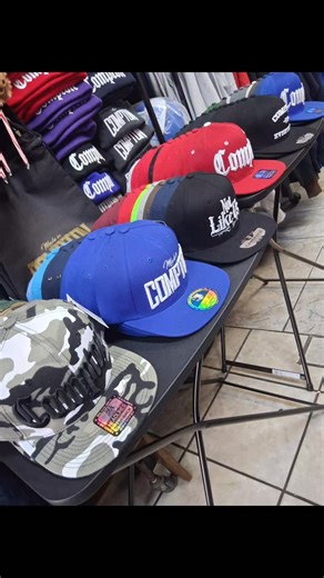 🧢 Compton Snapbacks Galore! 🔥 Keep your head warm and your style colder — we got different designs, different colors, same Compton energy! 💯 Pull up to the Made in Compton Store, 906 S. Willowbrook Ave Unit B, or shop online at micpt.com 🏙️ 🎨 Find your color. Rep your city. Stay Made in Compton. | Mako Capone