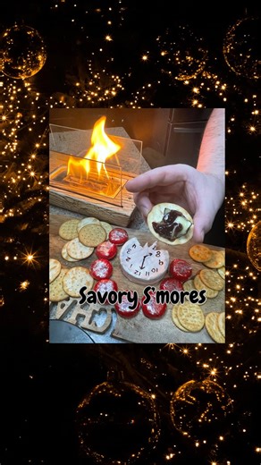 WalkerzWay on Instagram: "🎉 Savory S’mores The Ultimate New Year’s Eve Party Trick! 🧀🔥 Forget sweet treats. These savory bites steal the spotlight. If you’re looking for a fun, interactive way to elevate your charcuterie board and ring in 2026, this is it! ✨ How to Create a New Year’s Themed Board • Use crackers and brie to shape 2026 • Add a festive touch by drawing a clock face on top with an edible marker for perfect countdown vibes ⏰ 🔥 Now for the Savory S’mores Fun Fire up your tabletop
