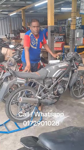 Suzuki Motorcycle Repair Tips in a Workshop