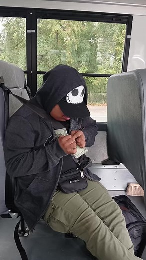 Counting Cash on a Bus: A Unique Perspective