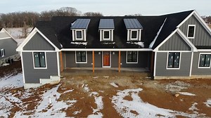 We love this combination of LP® SmartSide® ExpertFinish® colors in Cavern Steel siding and Snowscape White Trim by @lonerganbuilders. What color combinations are your clients asking for this year? | LP Building Solutions for Professionals