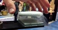Frozen Puck Hovers Over Track Using "Quantum Levitation"