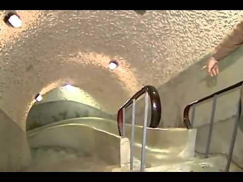 Chinese reporter going down slide!