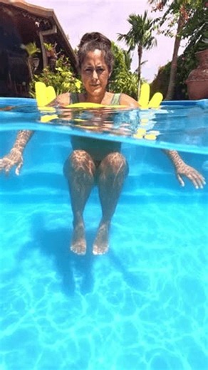 clip-3990966227-woman-performing-leg-exercises-using-pool-noodle