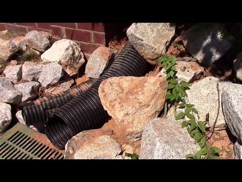 Rip Rap and 6" Inch Drain Pipe - Stop Water from Overflowing Retaining Wall