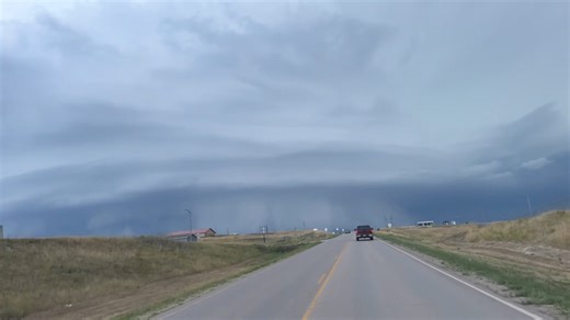 SUPERCELL STRUCTURE OF THE YEAR with dangerous storm approaching Kyle, South Dakota with #tornado warning earlier. This has since transitioned into a pure wind bag straddling the SD/NE border | Reed Timmer Extreme Meteorologist