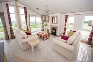 ABI Harrogate Lodge for Sale at Tree Tops Caravan Park, North Wales. Our stunning ABI Harrogate lodge is now ready to view and is getting a lot of interest. Located on the top of our Ynys Hir development, this luxury lodge has outstanding sea views. If you would like to arrange a viewing or would like more information please call 01745 560279. | Tree Tops Caravan Park