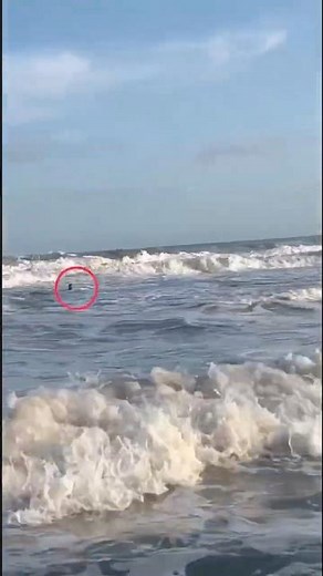 Coast Lifeguard in Action During Rescue