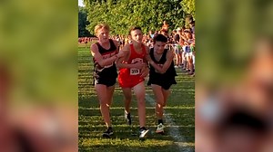 Watch what these two cross country runners do after someone from an opposing team falls down before winning second place. | Humankind