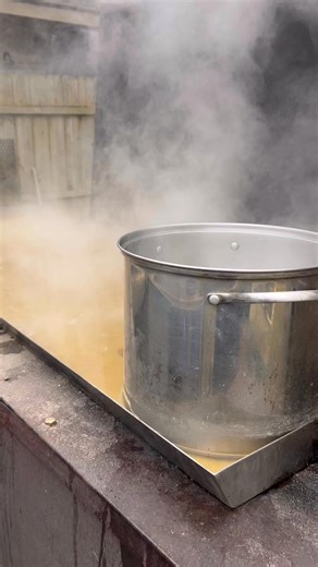 The sap is running in the neighborhood maple trees. Boiling it down on some homemade equipment. Quite a set up to gather sap from the trees. | Tim Offerle