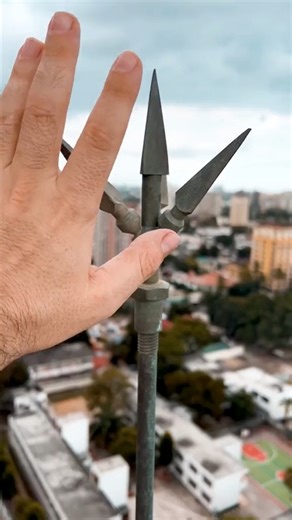 A lightning protection system consists of lightning rods, conductors, and grounding systems installed on buildings to redirect lightning strikes safely into the ground, minimizing damage and reducing the risk of fire or injury. | Architect Russell