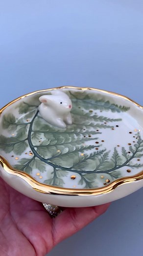 Besides good luck and good fortune, the rabbit symbolizes renewal and new beginnings (coming from their appearance in early spring). The white rabbit is specifically associated with new spiritual beginnings, the release of old fears, and the welcoming of hope and possibilities. I love how bunnies bring a feeling of childlike wonderment and storybook magic. How lovely to embrace more of that wonder and curiosity in how we see the world every day. This ceramic bunny dish is made with a fern frond 