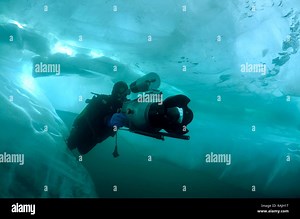 Underwater video-operator Didier Noirot, ice-diving in Lake Baikal, Olkhon island, Siberia, Russia, Eurasia Stock Photo - Alamy