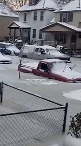 Cars were found frozen and inoperable after a 54-inch water main ruptured in the southeast part of Detroit on Feb. 17, flooding streets and homes. | USA TODAY