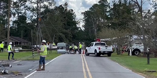 Linemen work to restore power in Ray City, Georgia