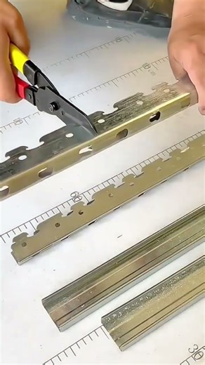 Cutting metal strip with tin snips
