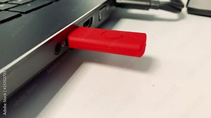 Insert a USB stick into a laptop