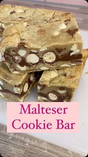 4.9K views · 2.9K reactions | Malteser Cookie Bar ⭐️ Vanilla chocolate chip cookie dough with a generous filling of chocolate spread and maltesers! Pop this one in the microwave for 10-20seconds till meltyyyy, add a dollop of ice cream and you’ve got the perfect dessert! | SJ Cakes | Facebook