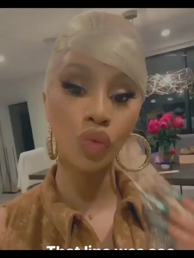 Cardi B Stuns in Brown Louis Vuitton Ensemble