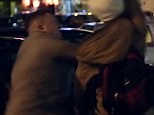 Tommy Robinson punches migrant in Rome after filming in 'no-go zone'