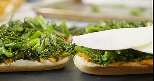 Adding cheese to broccolini Philly cheesesteak