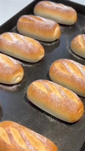 Fluffy rice flour sandwich bread 🥰 dough preparation in the mixer bowl rice bread flour 160g bread flour 160g sugar 30g instant dry yeast 6g milk powder 30g water 210ml knead the dough for 5min butter 40g salt 4g knead the dough for 8min rest the dough for 60min separate the dough into 6 pieces make balls cover the dough rest the dough for 30min make the bread flour on the kitchen surface roll the dough rice flour on the top cut the bread on the top rest the dough for 60min Bake in a preheated 