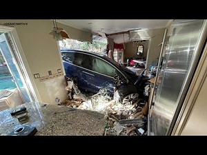 Tesla crashes into back of San Mateo home, police say