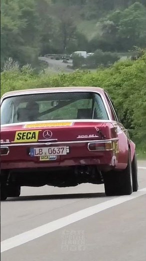 Mercedes Benz 300 SEL 6 8 AMG Rote sau driving at the Nürburgring