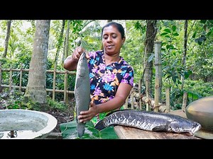 A healthy meal with traditional red rice and shol fish curry. .village kitchen recipe/fish recipe